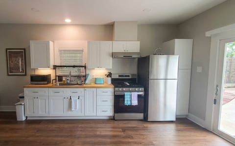 Open and spacious, our fully equipped kitchen has all the cookware, appliances, and essentials needed for a hassle-free stay. It flows seamlessly into the living and dining areas—perfect for gathering and entertaining.
