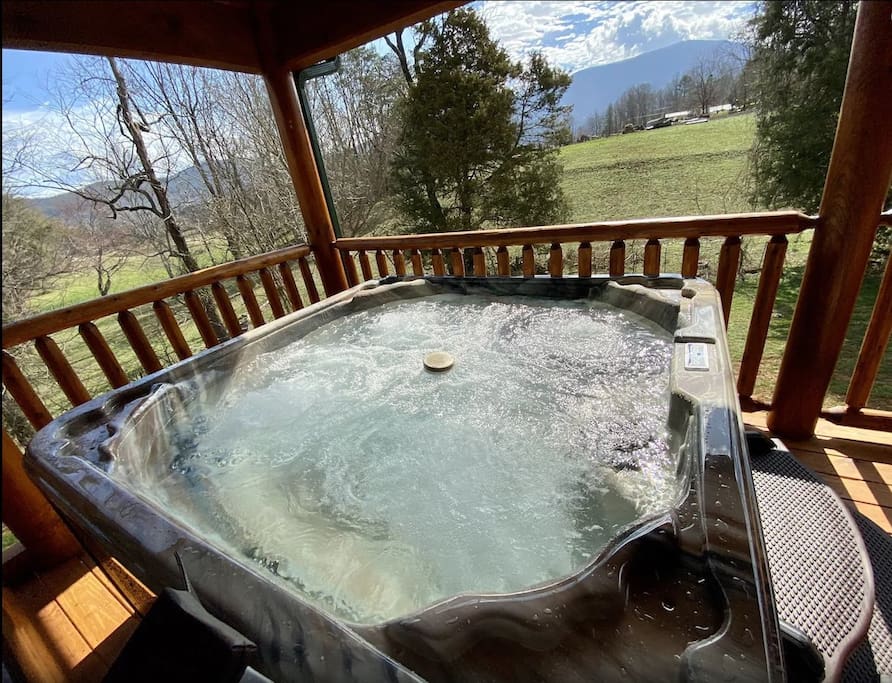 Sever Person Hot Tub with Mountain View on the Back Porch
