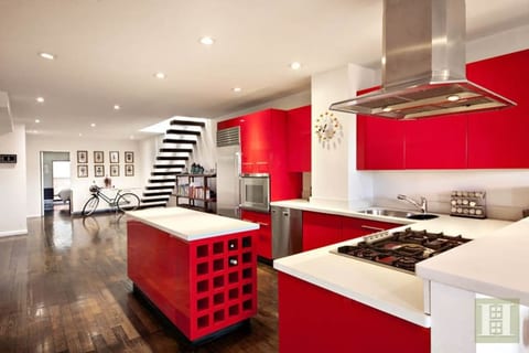 View from the opposite direction, into the kitchen and toward the main bedroom