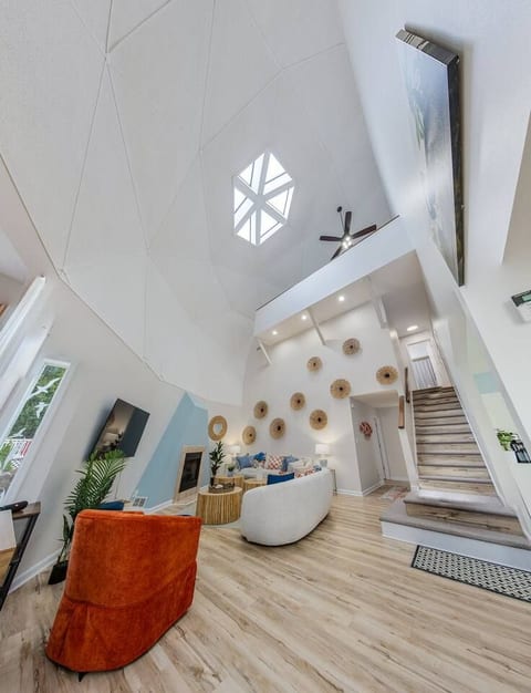 Dome roof with skylight over living room provides all day daylight.