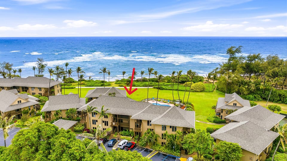 Green lawns and palms spill from your door to the open ocean.