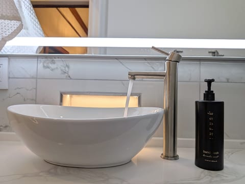 Bathroom #2 sink with backlighting.