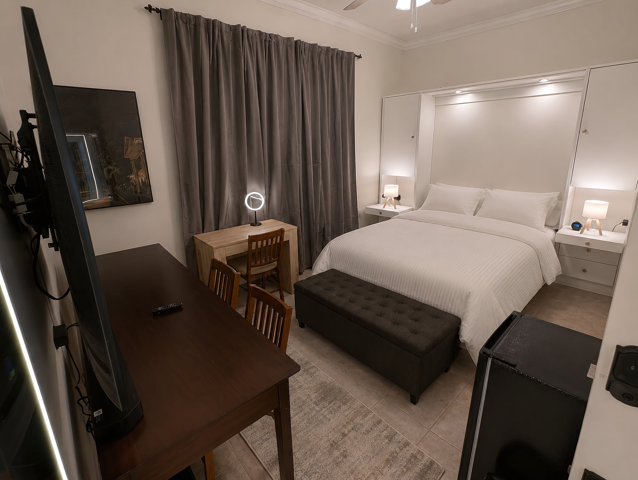 Oakview room with bed lights on.