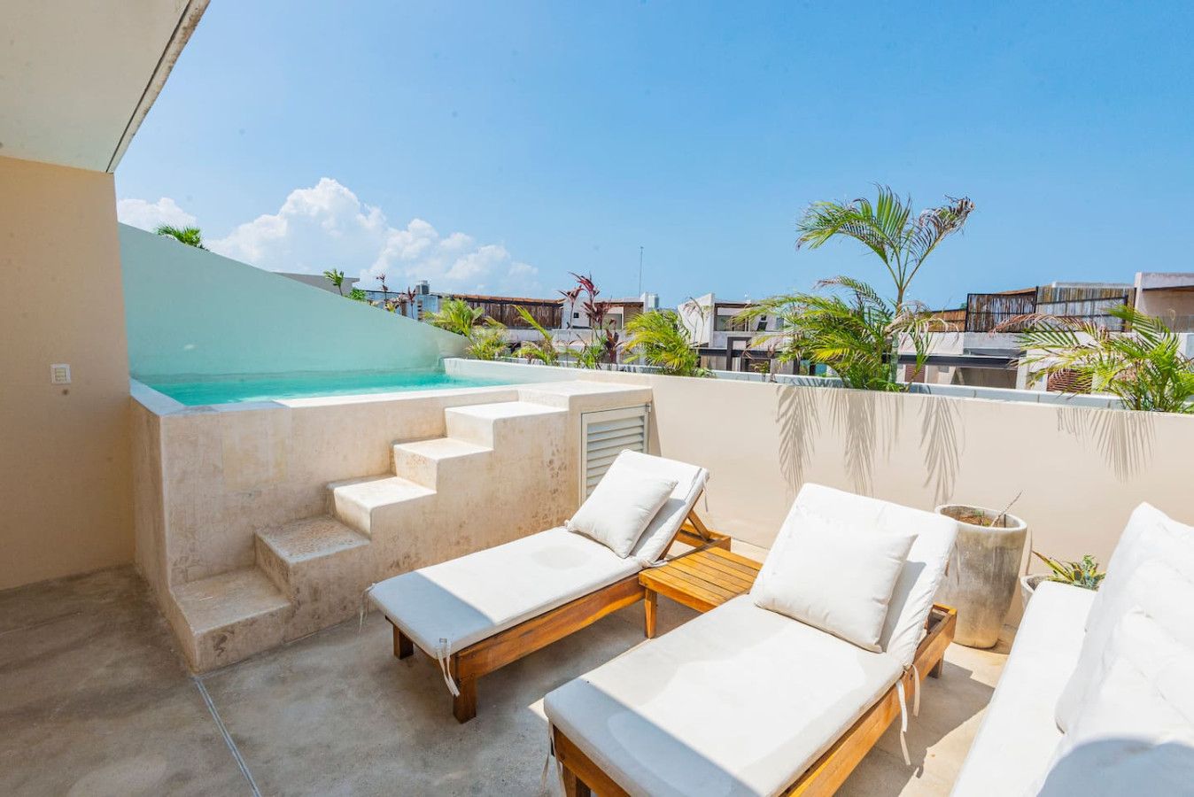 The rooftop features a beautiful terrace, a private pool, and outdoor furniture, providing a perfect space to relax and enjoy.