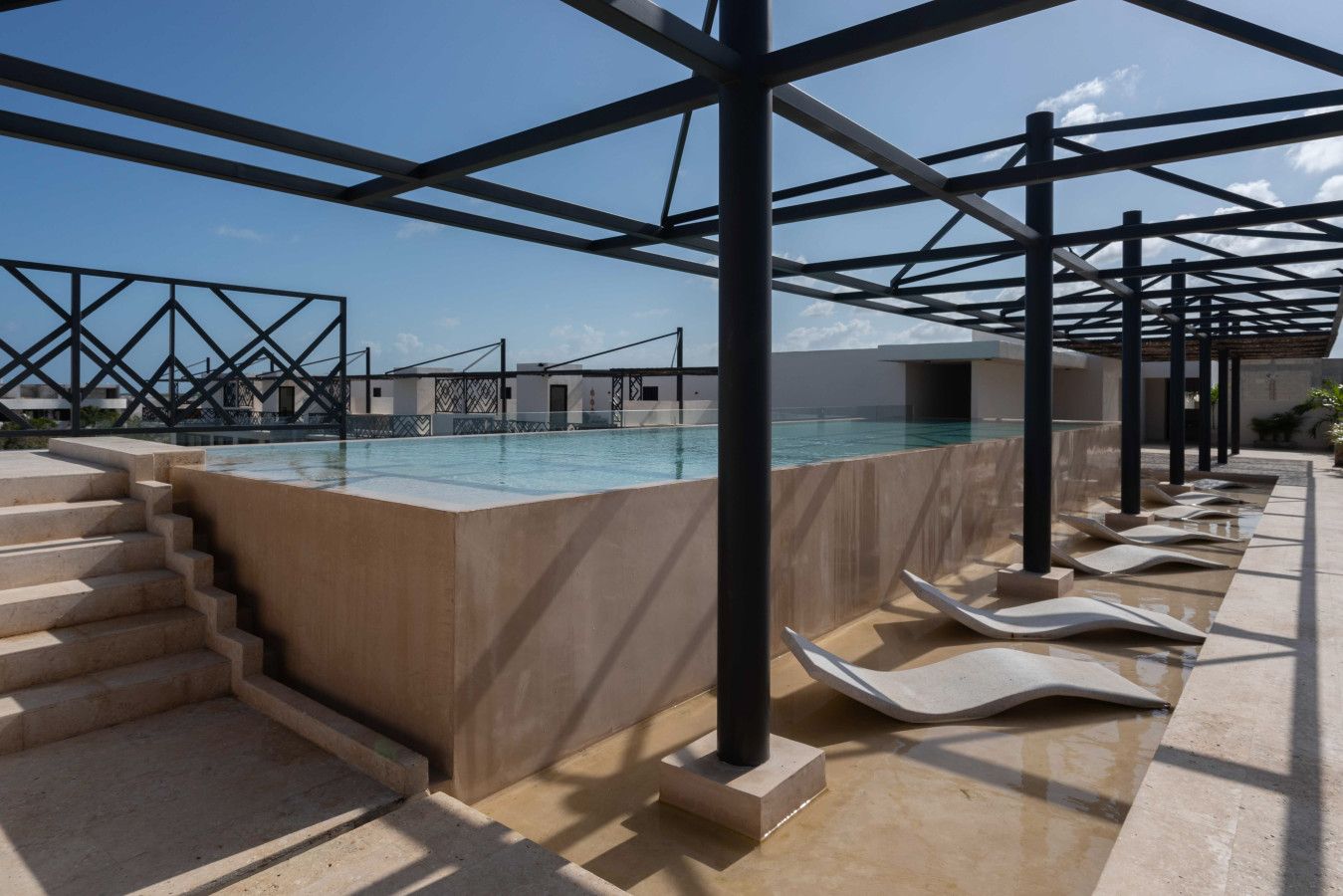 By the side of the olympic pool you will find plenty of sundecks with your feet in the water. This is a fantastic space to take some sun and to relax after a day of visits around Tulum!