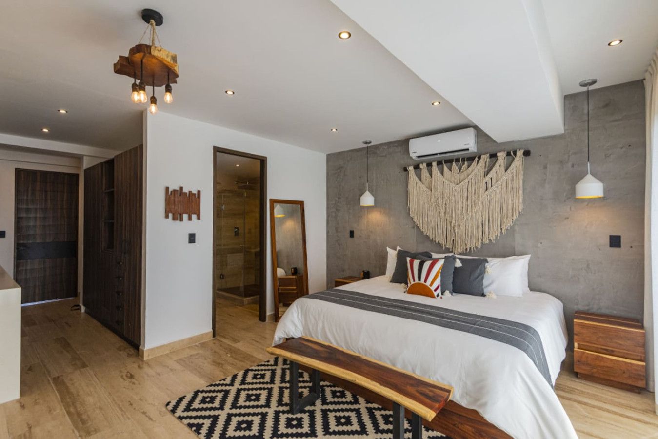 Serenity redefined: Indulge in bedroom whit a king-size bed haven with a private bath, smart TV, and tasteful, elegant décor a sanctuary of comfort and style.