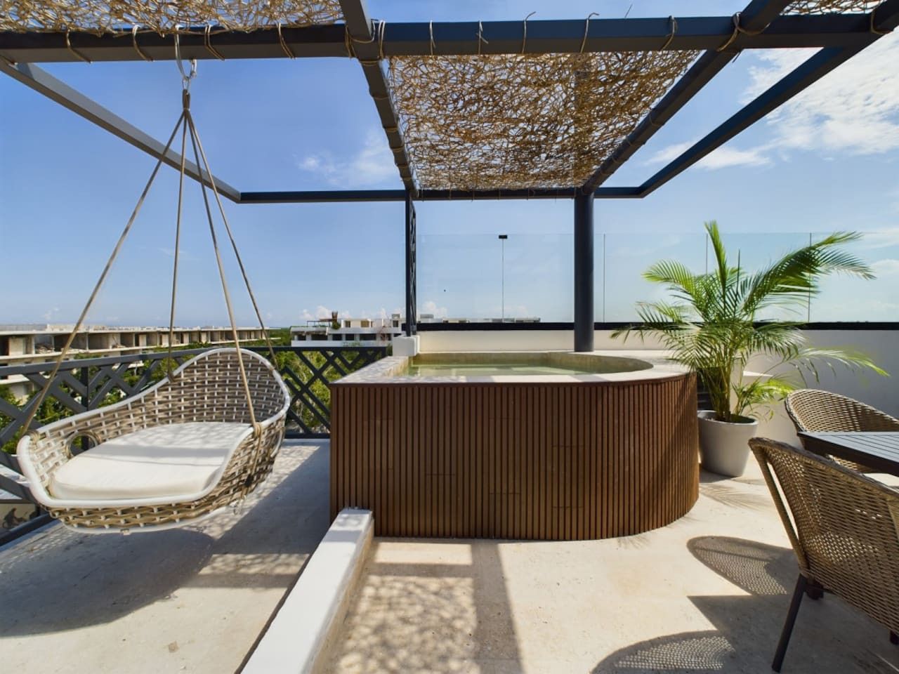 Unwind with a cocktail in your own private pool, surrounded by stunning Tulum views. Escape to paradise!