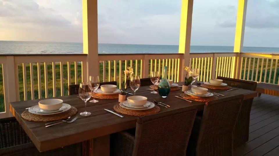 1st floor: A covered deck, Breakfast on the beach with a gorgeous Gulf view.  Don't you wish to be here.