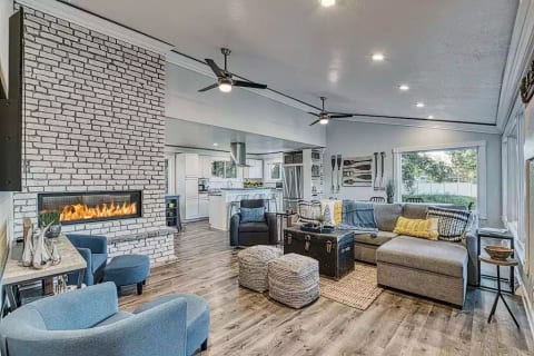Great room is entirely open-concept with unobstructed views to the Lake