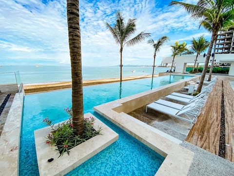Ocean View Beach Front Condo in the Center of Town