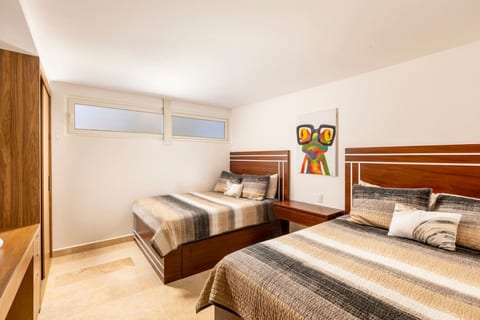 Oceanfront 2BR Escape with Stunning Views and Direct Beach Access