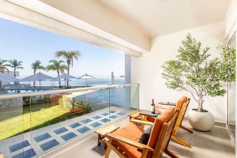 Oceanfront 2BR Escape with Stunning Views and Direct Beach Access