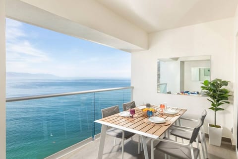 Designer 1BR Beachfront Retreat – Wake Up to the Waves