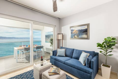 Designer 1BR Beachfront Retreat – Wake Up to the Waves