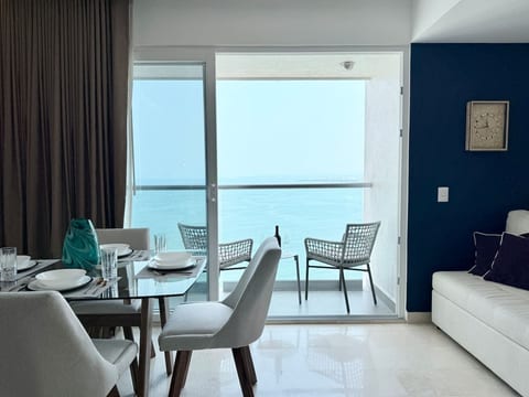 Open the balcony door to hear the waves