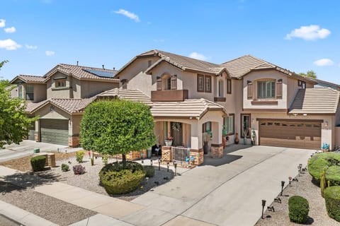 Spacious two-story home with great curb appeal and desert landscaping