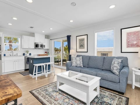 Whether you're enjoying your morning coffee, planning the day's adventures, or relaxing after sunset, this bright and cozy living area is designed to make you feel right at home.