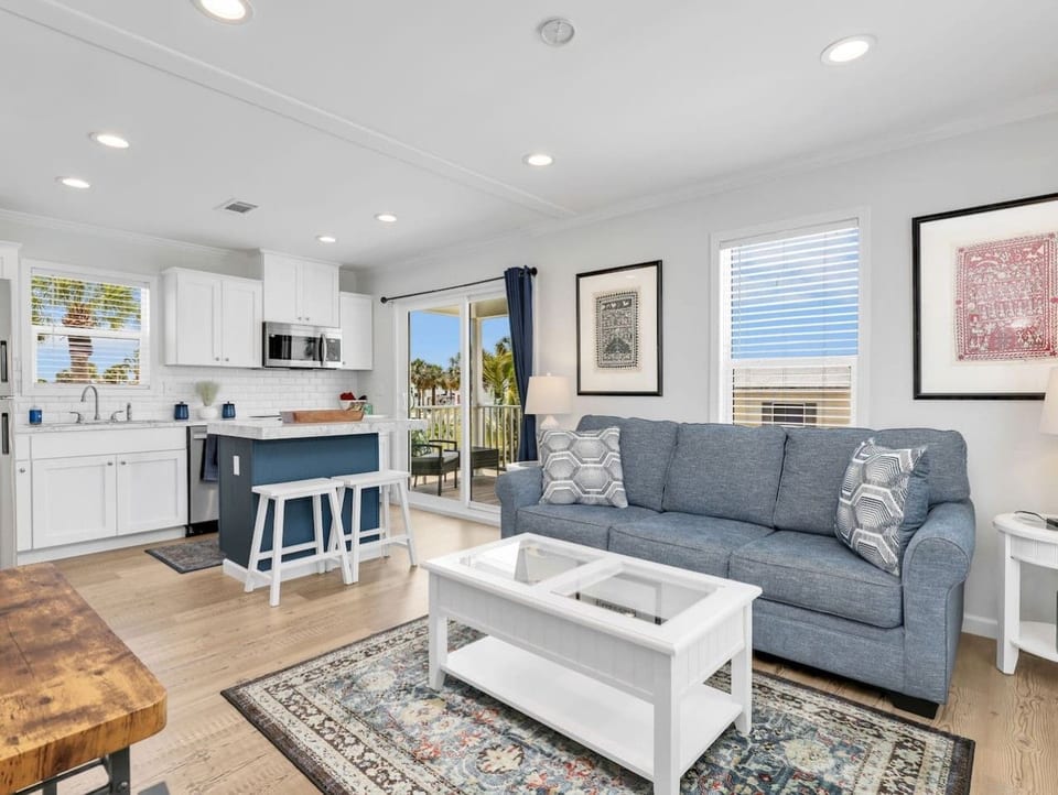 Whether you're enjoying your morning coffee, planning the day's adventures, or relaxing after sunset, this bright and cozy living area is designed to make you feel right at home.