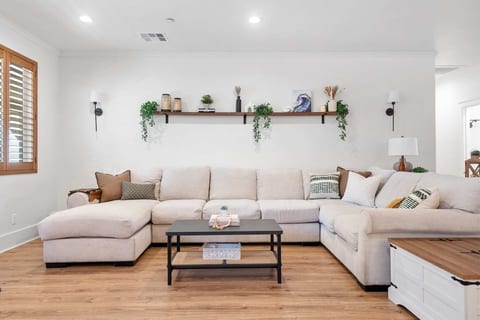Huge living room with enough seating for everyone! Great for movie nights!