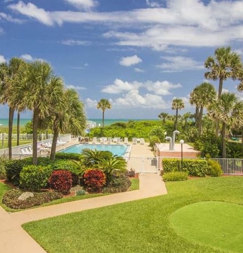 large pool, beautiful landscaping, ocean boardwalk