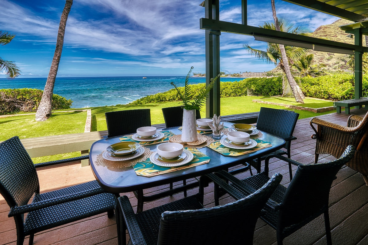 PARADISE FOUND! Relax & enjoy a meal on our huge lanai. Walk out backyard gate & onto the beautiful Makaha Beach. Watch surfers & enjoy amazing nightly sunsets. Watch whales, dolphins & sea turtles play from our lanai & house. Whale season Nov-March