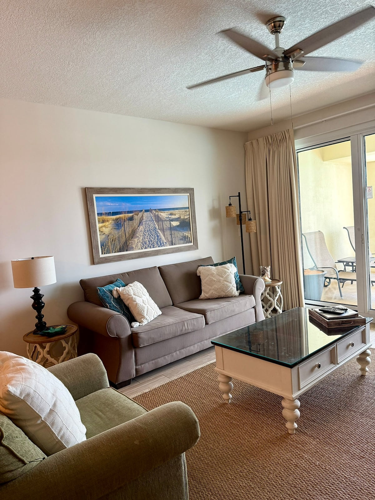Open concept living room with full size sleeper sofa bed.