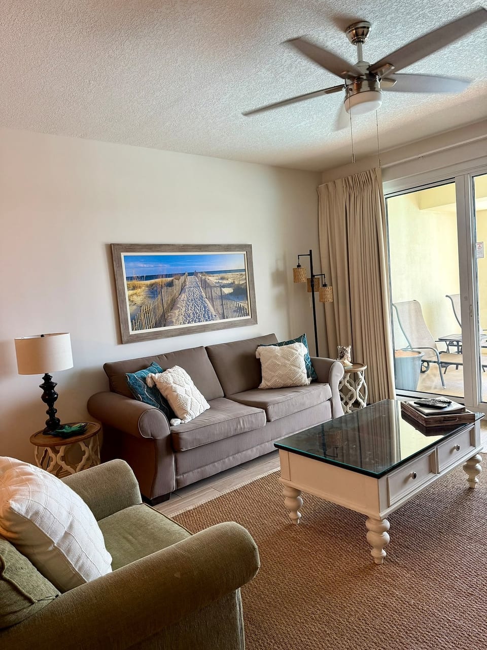 Open concept living room with full size sleeper sofa bed.