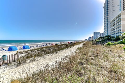 Take a short stroll down the sandy path leading straight to the beach—perfect for morning walks or sunset views by the water.
