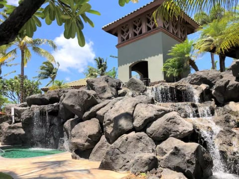 Lava rock hot tub and water falls