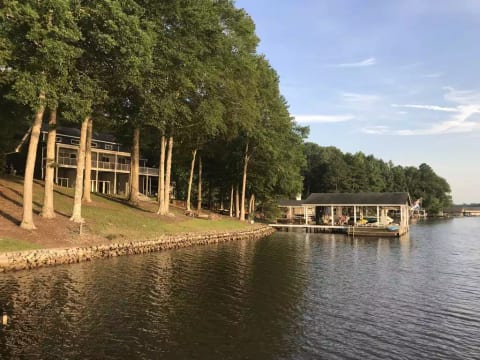 The yard is fairly flat with an easy walk between the house and the dock