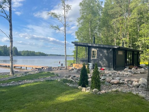 Sauna, nature, silence - riverside cabin image 1