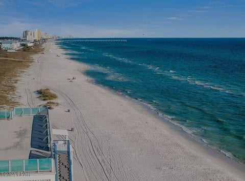 Sugar-white sand and emerald Gulf water right outside.