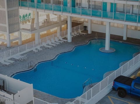 Beachfront pool and sundeck just steps from the white sand.