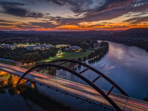 Stunning sunset river views with iconic bridge and scenic surroundings