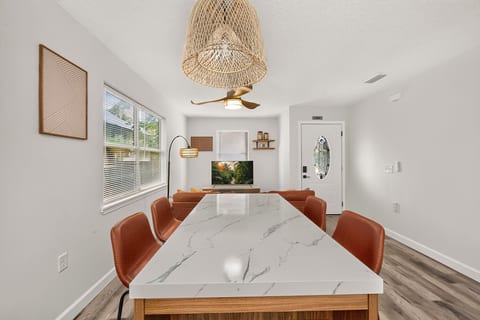 Bright modern dining space with stylish seating and natural light