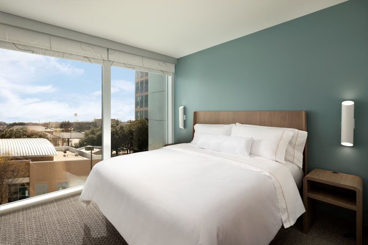 Domain Adjacent 1BR Suite: Pool/Gym/Free Breakfast image 1