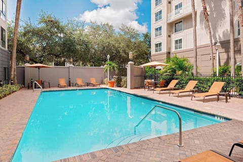 Urban Oasis: 2BR Suite with Gym, Pool & Breakfast image 5