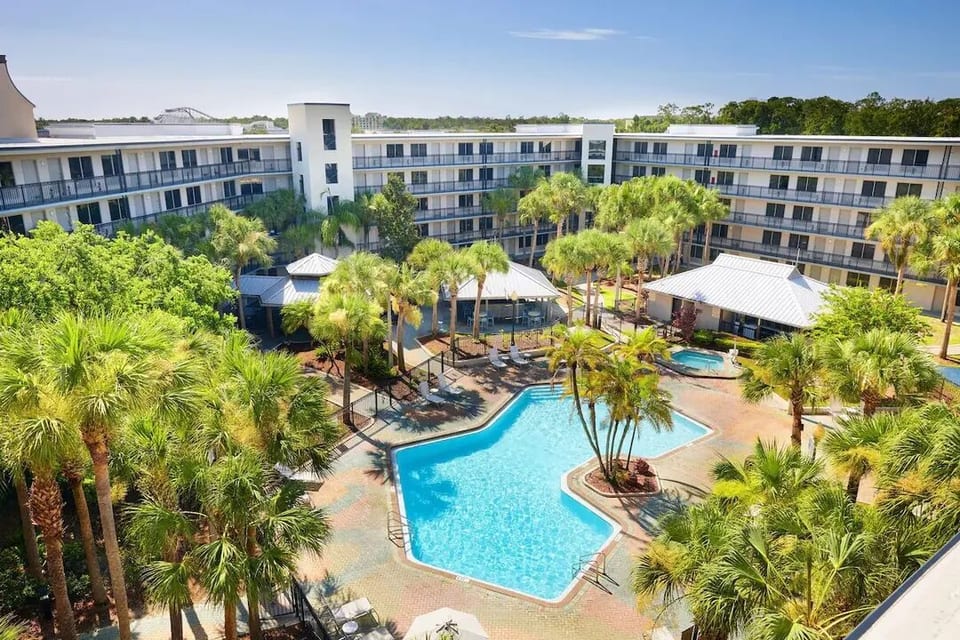 Disney 2BR Suite | Free Shuttle, Pool & Breakfast image 1
