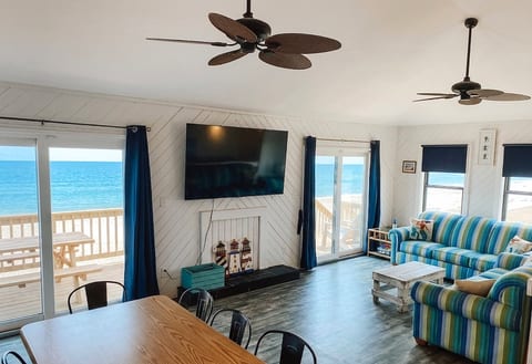 Living Room - tons of ocean and beach views! Features flat screen TV/Cable/DVD