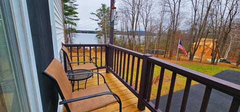 Private balcony with comfortable seating and peaceful lake views, perfect for enjoying your morning coffee or evening sunset.