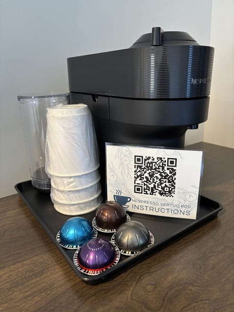 In-room Nespresso coffee maker with complimentary coffee pods for the perfect morning start.