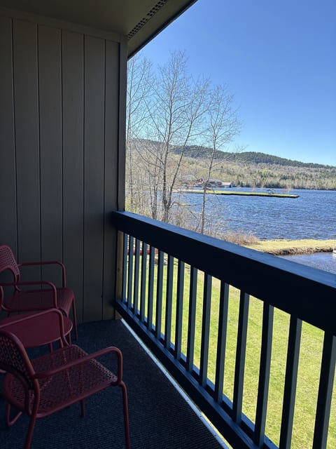 Private balcony with comfortable seating, perfect for enjoying fresh air and a relaxing getaway.