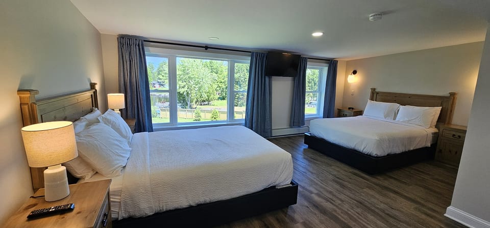 Spacious room with two plush queen bedsβperfect for families or friends