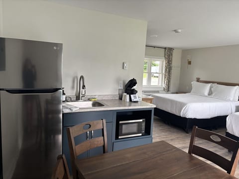 Includes a kitchenette with essentials for easy in-room meals.