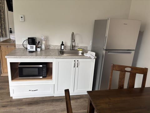 Kitchenette with seating for four people.