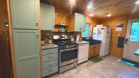 Fully equipped kitchen with everything you need for a comfortable cabin stay.