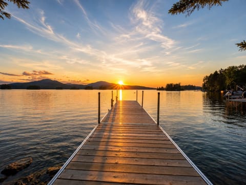 Private dock with stunning sunset views across the lake and surrounding mountains.