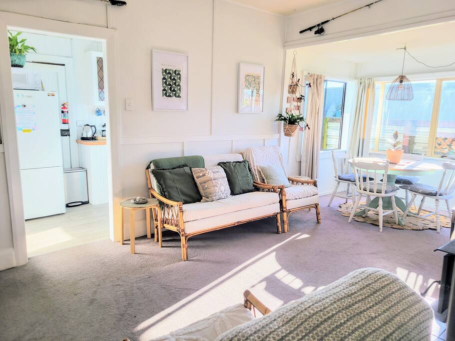 Lounge area. 
"Great house with history. Brought gold town experience alive. Good location off the beach and near the town centre. Good host who thought of everything the weary traveller needs." Jean.