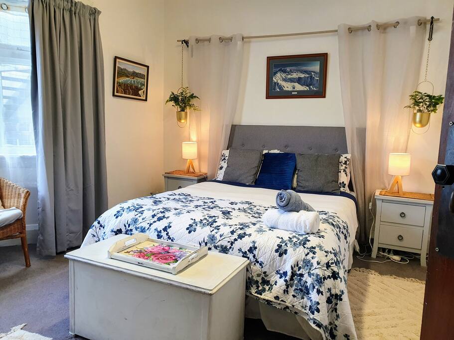 Large bedroom with queen bed. 