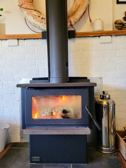 The woodfire keeps the house  warm (during the winter months only). You must be familiar with how to use a woodburner if you want to use it.